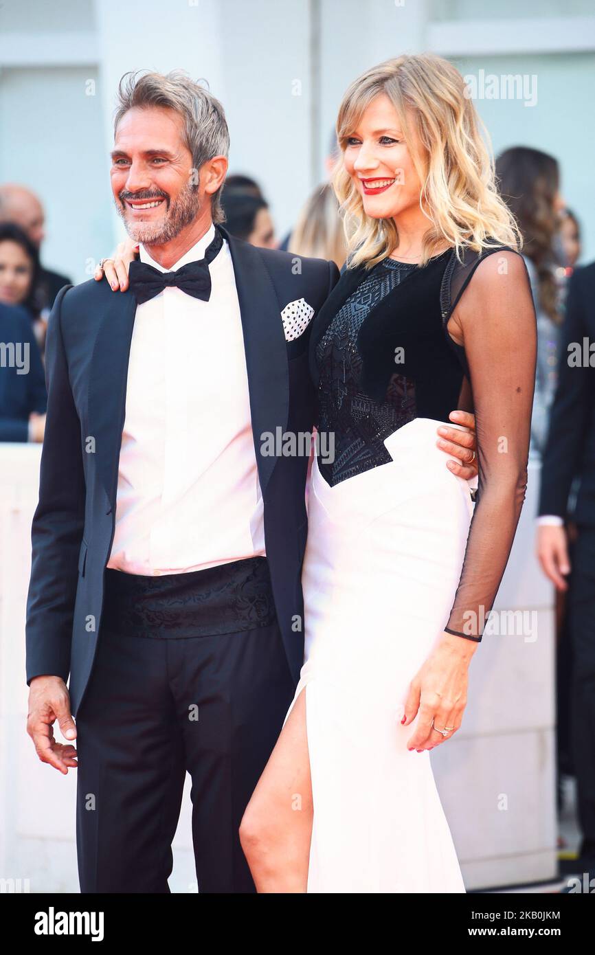 Natasha Stefanenko and Luca Sabbioni walks the red carpet ahead of the