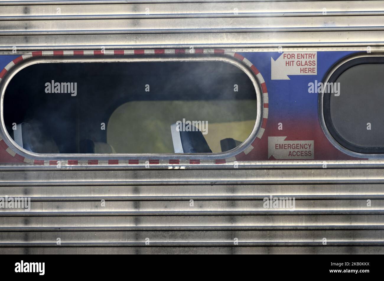 With a triple digits heat index, firefighters battle a fire on a