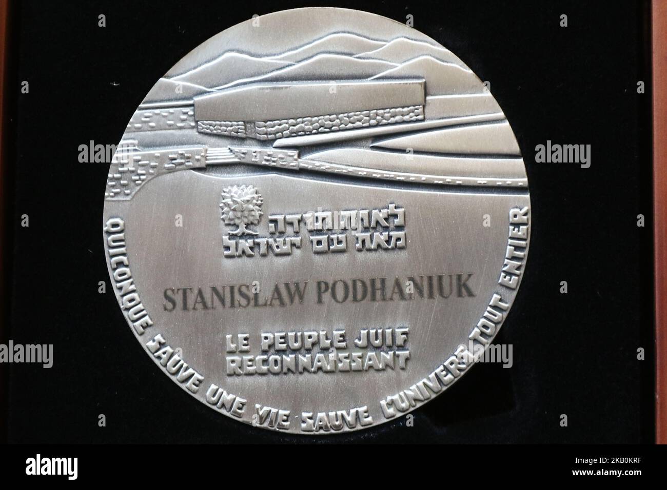 A medal with a Stanislaw Podhaniuk name is seen in Gdansk, Poland on 30 August 2018 The Embassy of Israel with Yad Vashem honored posthumously six Righteous Among the Nations, non-Jews who saved the lives of Jews during World War II. (Photo by Michal Fludra/NurPhoto) Stock Photo