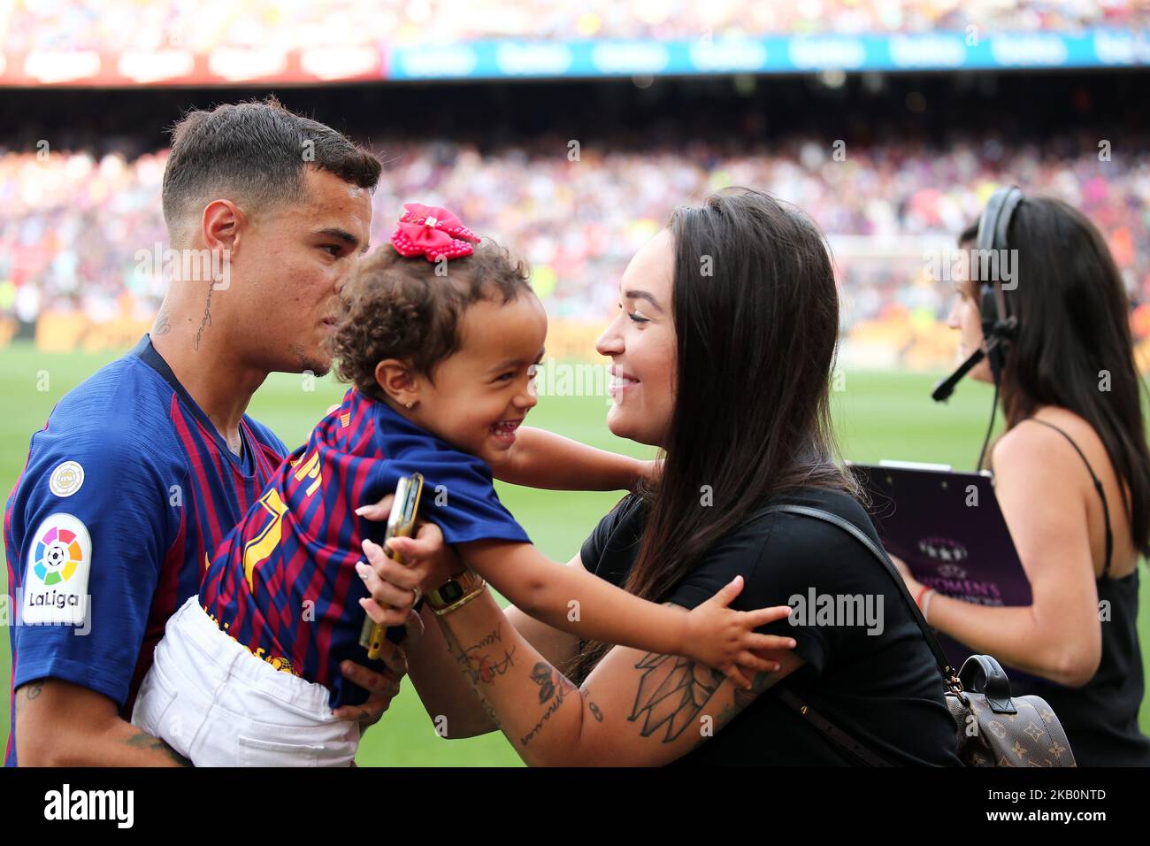 Philippe Coutinho with his daughter and his wife during the match between FC Barcelona and SD Huesca, corresponding to the week 3 of the Liga Santander, played at the Camp Nou, on 02th september 2018, in Barcelona, Spain. -- (Photo by Urbanandsport/NurPhoto) Stock Photo