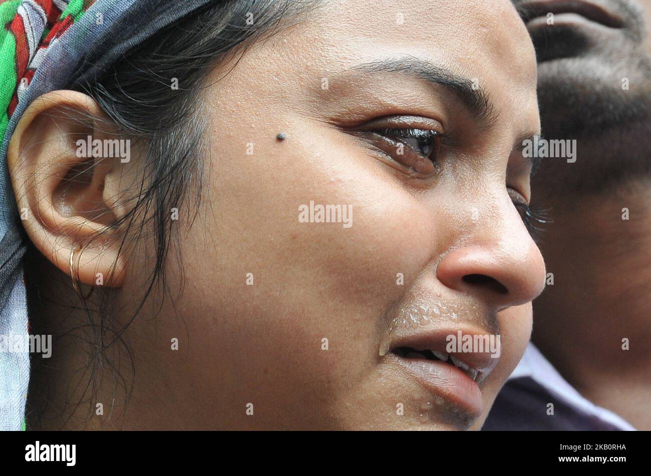 A major Injury person wife cry at front of Emergency SSKM Hospital of the Majerhat bridge collapsed in Kolkata in the Indian state of West Bengal on September 5, 2018. (Photo by Debajyoti Chakraborty/NurPhoto) Stock Photo