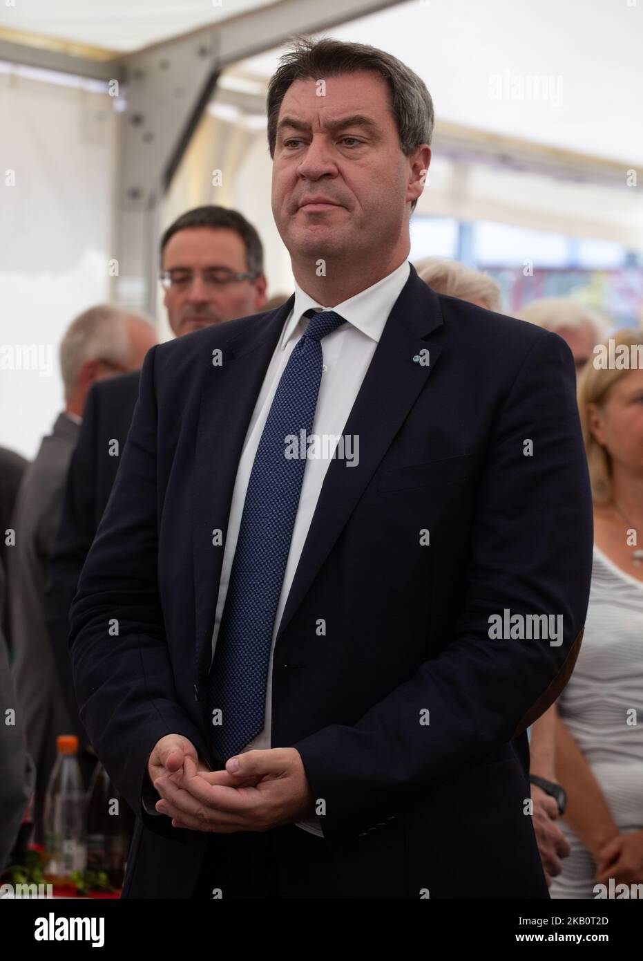Markus Soeder praying. The Bavarian governor (Ministerpraesident) and the  Bavarian minister of health and care Melanie Huml (both of the CSU)  inaugurated the expansion of the hospital in Bamberg, Northern Bavaria, on