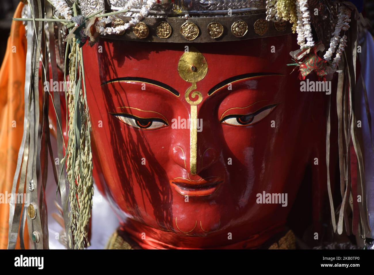 A Portrait of Idol Dipankar Buddha during Pancha Dan festival celebrated in Bhaktapur on Friday, September 07, 2018. Pancha Dan is the festival of offering five summer gifts of wheat and rice grains, salt, money, and fruit, representing five elements. (Photo by Narayan Maharjan/NurPhoto) Stock Photo