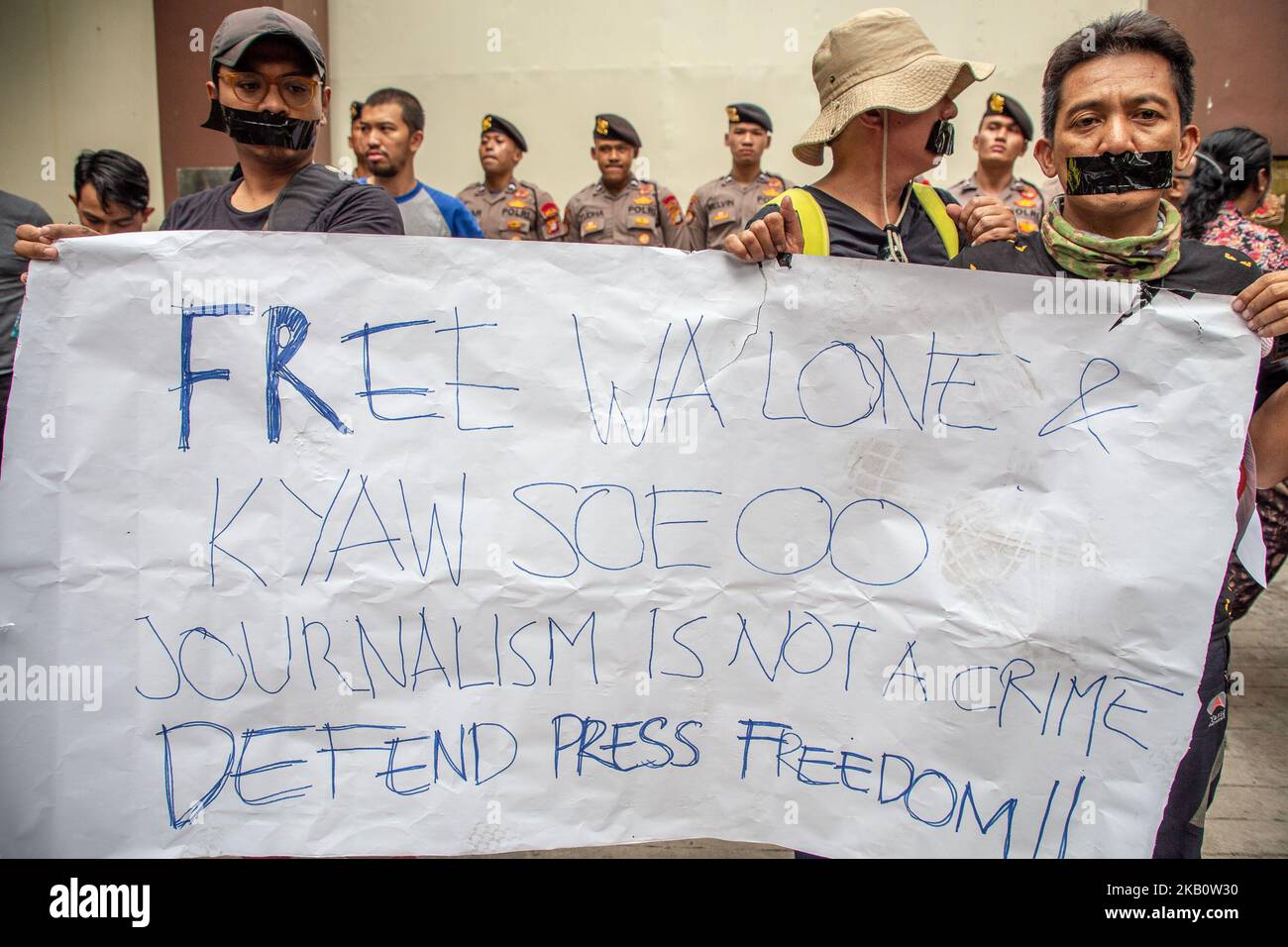 A number of Indonesian journalist which joined in the Alliance of Independent Journalist organization held a rally outside the Myanmar's embassy in Jakarta, on Friday, September 7, 2018. They condemned the Myanmar government that jailed two Reuters journalist, Wa lone and Kyaw Soe Oo regarding reports of Myanmar's military attack on Rohingya Muslim ethnic, and urged the Myanmar government to immediately release the two journalist. (Photo by Donal Husni/NurPhoto) Stock Photo