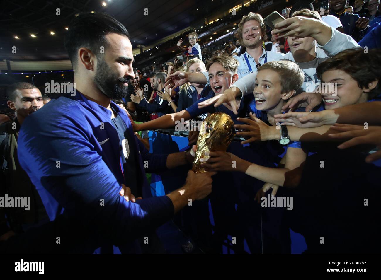 Adil Rami of France celebrate with the World Cup Trophy after the UEFA Nations League A group official match between France and Netherlands at Stade de France on September 9, 2018 in Paris, France. This is the first match of the French football team at the Stade de France since their victory in the final of the World Cup in Russia. (Photo by Mehdi Taamallah / NurPhoto) Stock Photo