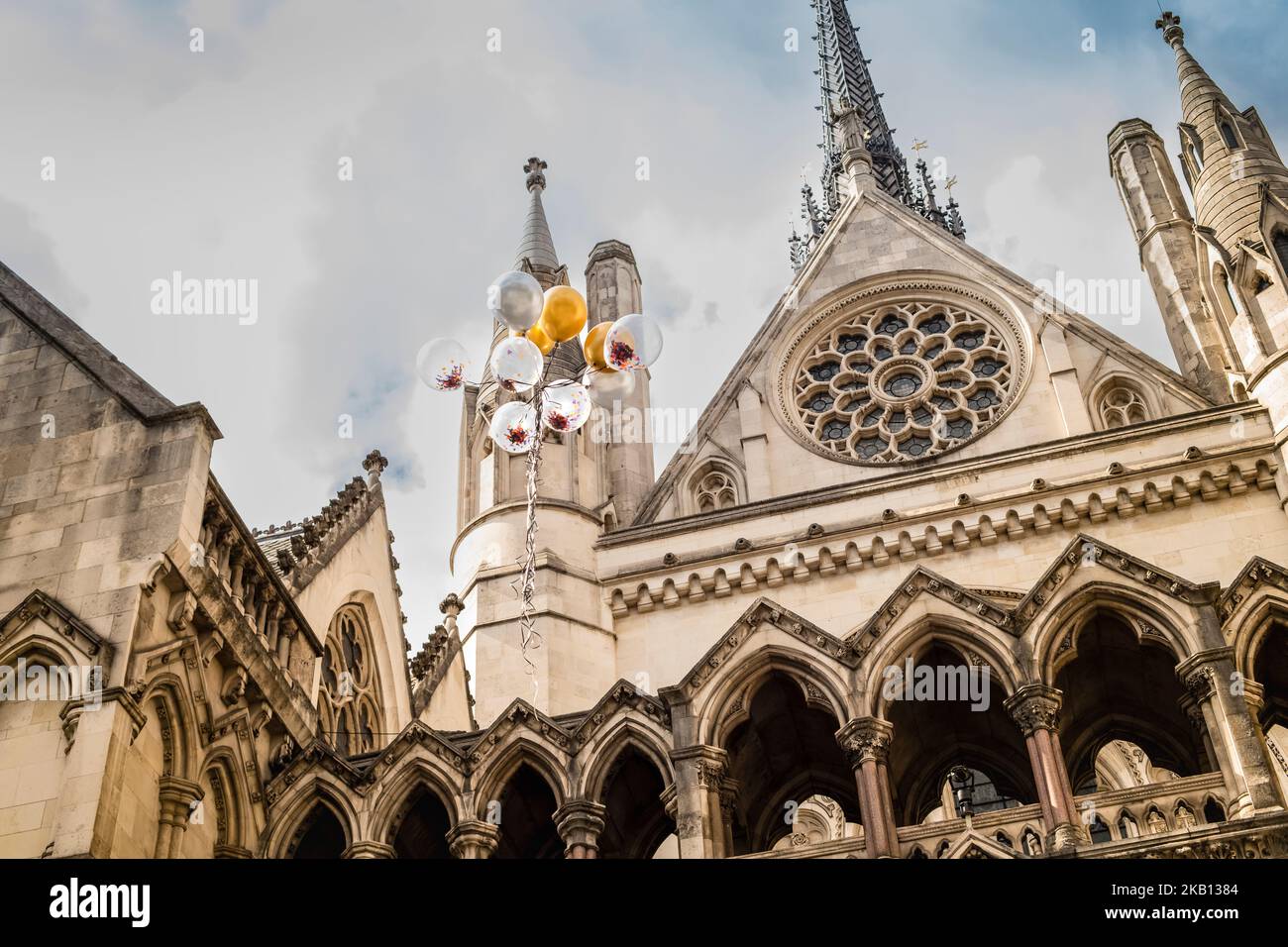 Looking up at the law courts in London balloons have been released in conjunction with the Johnny Depp,  Amber Heard trial Stock Photo