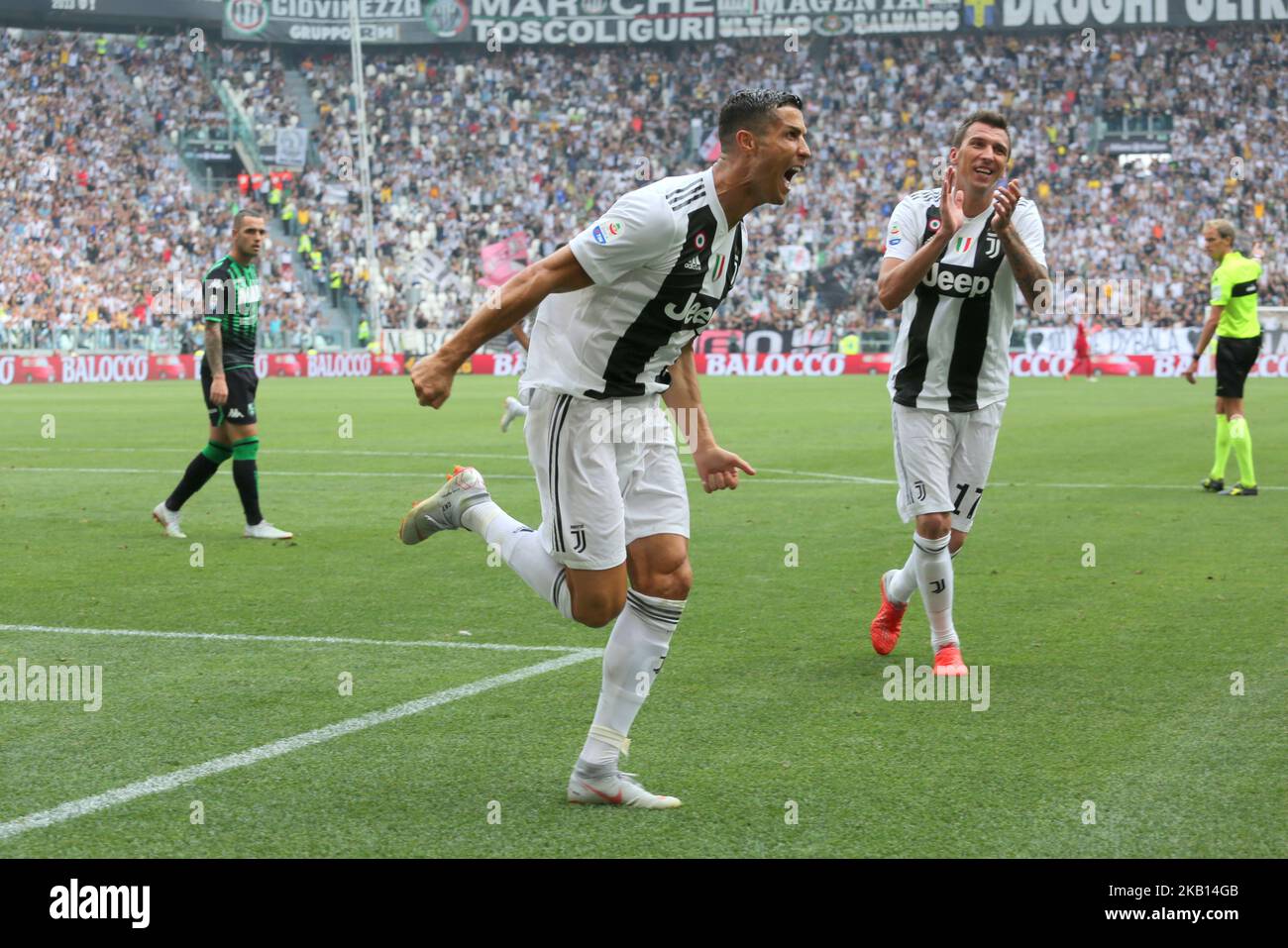 David Hancko of Fiorentina pulls on the shirt of Cristiano Ronaldo of  Juventus during the Serie A match at Allianz Stadium, Turin. Picture date:  20th April 2019. Picture credit should read: Jonathan