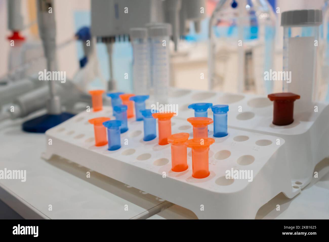 Medical plastic vials in showcase at pharmaceutical exhibition Stock