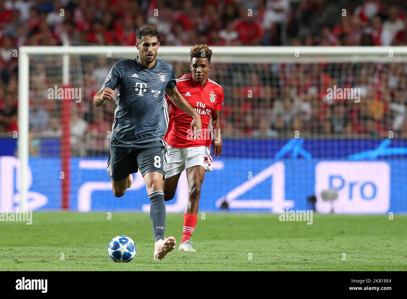Bayern Munich s Midfielder Javi Martinez From Spain Vies With Benfica s 