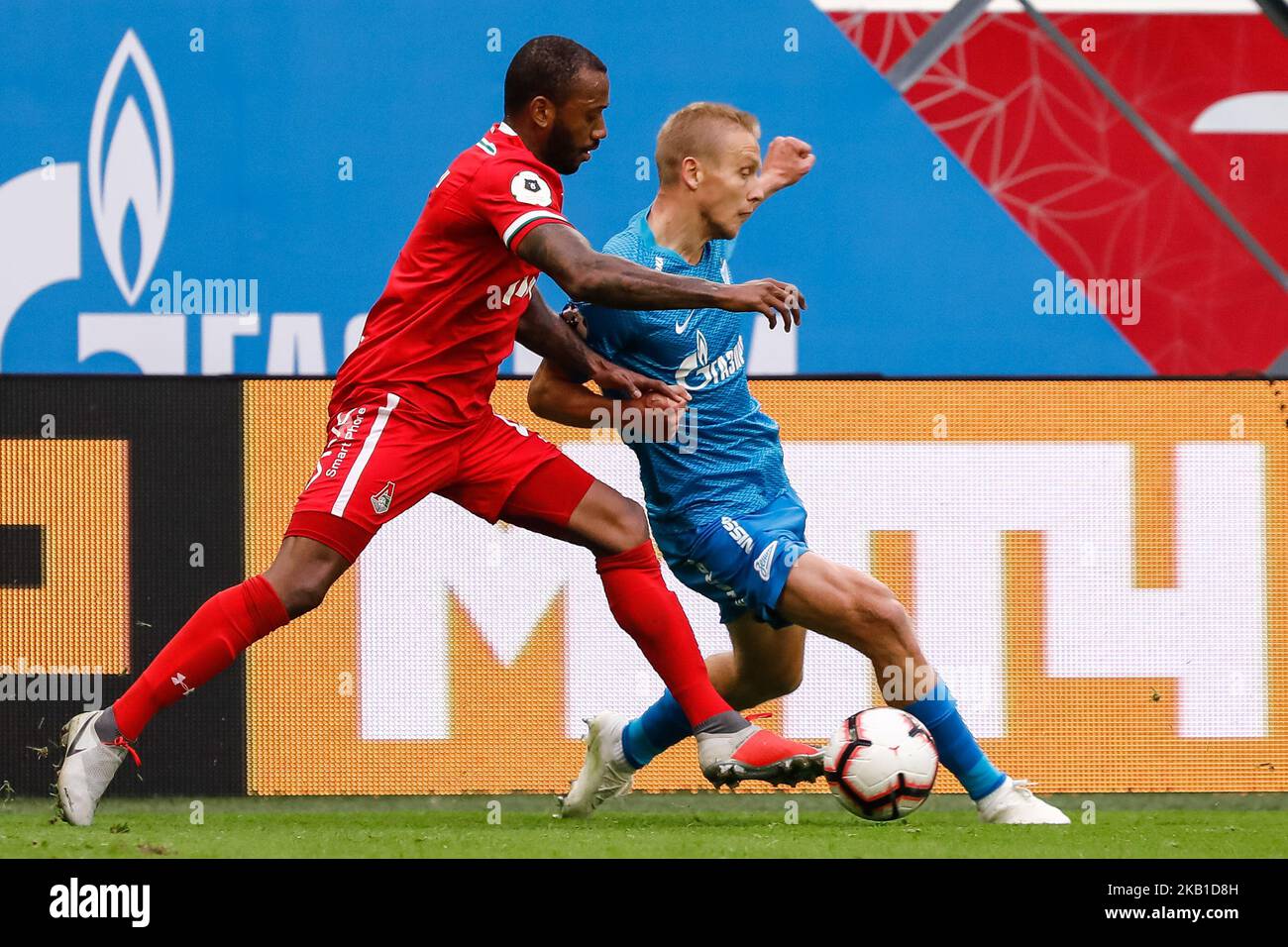 Igor Smolnikov (R) of FC Zenit Saint Petersburg and Manuel Fernandes of FC Lokomotiv Moscow vie for the ball during the Russian Premier League match between FC Zenit Saint Petersburg and FC Lokomotiv Moscow on September 23, 2018 at Saint Petersburg Stadium in Saint Petersburg, Russia. (Photo by Mike Kireev/NurPhoto) Stock Photo