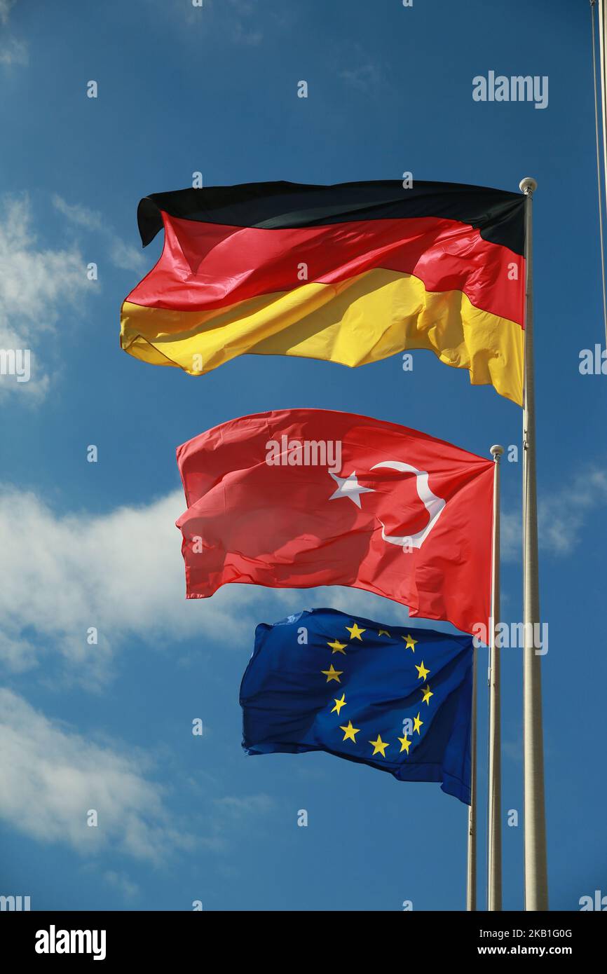 Flags of the EU, Turkey and Germany fly after the arrival of Turkish President Recep Tayyip Erdogan at Tegel airport in Berlin, Germany on September 27, 2018. Erogan will be on official visit in Germany from September 27 to 29, 2018. (Photo by Emmanuele Contini/NurPhoto) Stock Photo