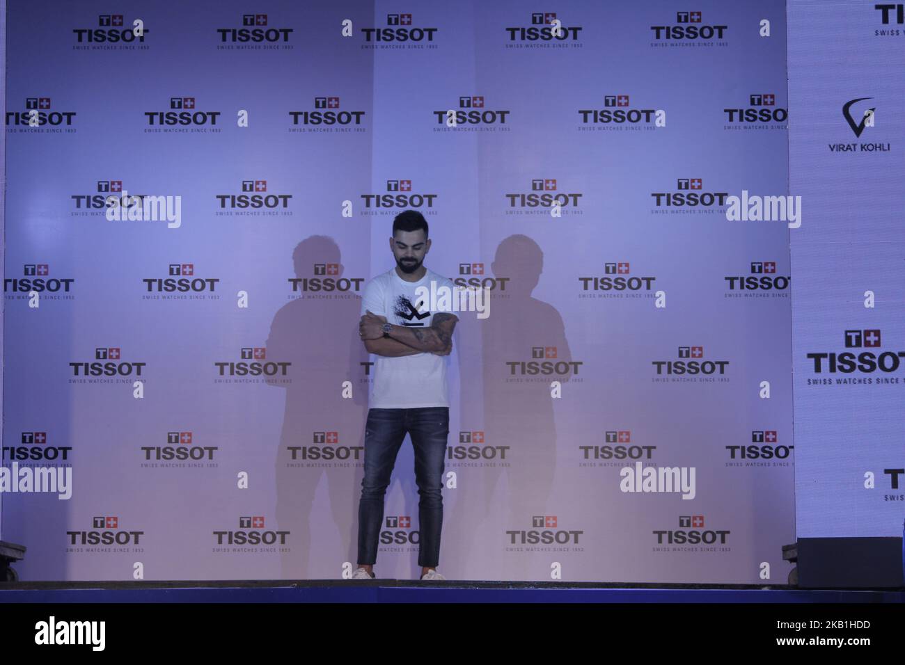 Virat Kolhi an Indian international cricketer who currently captains the India national team at the unveiling of their special edition Tissot CHRONO XL Classic at hotel Taj Land Ends in Mumbai on September 26, 2018. The Tissot Chrono XL Classic edited especially for Virat Kohli embodies a unique set of customizations that personify Tissot Ambassador. Known as the Tissot Chrono XL Classic Virat Kohli 2018, the watch features his navy blue logo engraved on its white silk-printed caseback and a navy blue leather strap enhances the sporty aesthetics of this special edition. The stopwatch number 20 Stock Photo
