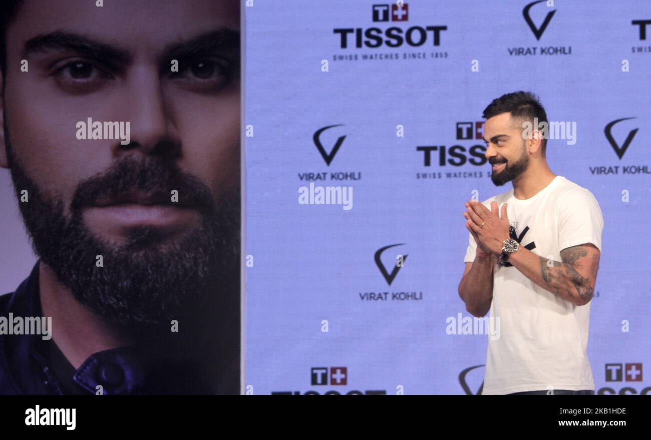 Virat Kolhi an Indian international cricketer who currently captains the India national team at the unveiling of their special edition Tissot CHRONO XL Classic at hotel Taj Land Ends in Mumbai on September 26, 2018. The Tissot Chrono XL Classic edited especially for Virat Kohli embodies a unique set of customizations that personify Tissot Ambassador. Known as the Tissot Chrono XL Classic Virat Kohli 2018, the watch features his navy blue logo engraved on its white silk-printed caseback and a navy blue leather strap enhances the sporty aesthetics of this special edition. The stopwatch number 20 Stock Photo