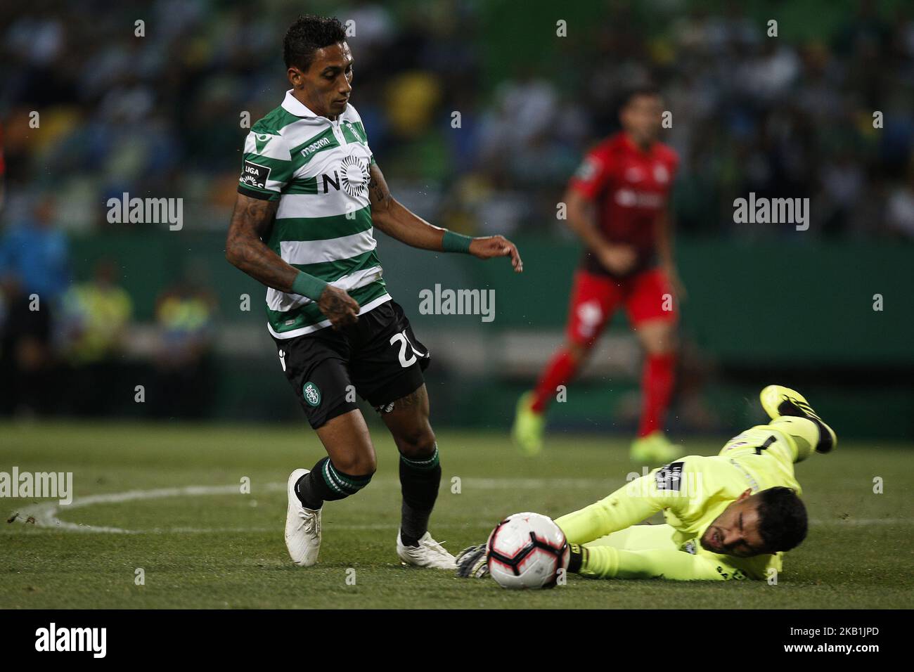 Raphinha of Sporting (L) vies for the ball with Amir Abedzadeh of Maritimo (R) during Primeira Liga 2018/19 match between Sporting CP vs CS Maritimo, in Lisbon, on September 29, 2018. (Photo by Carlos Palma/NurPhoto) Stock Photo