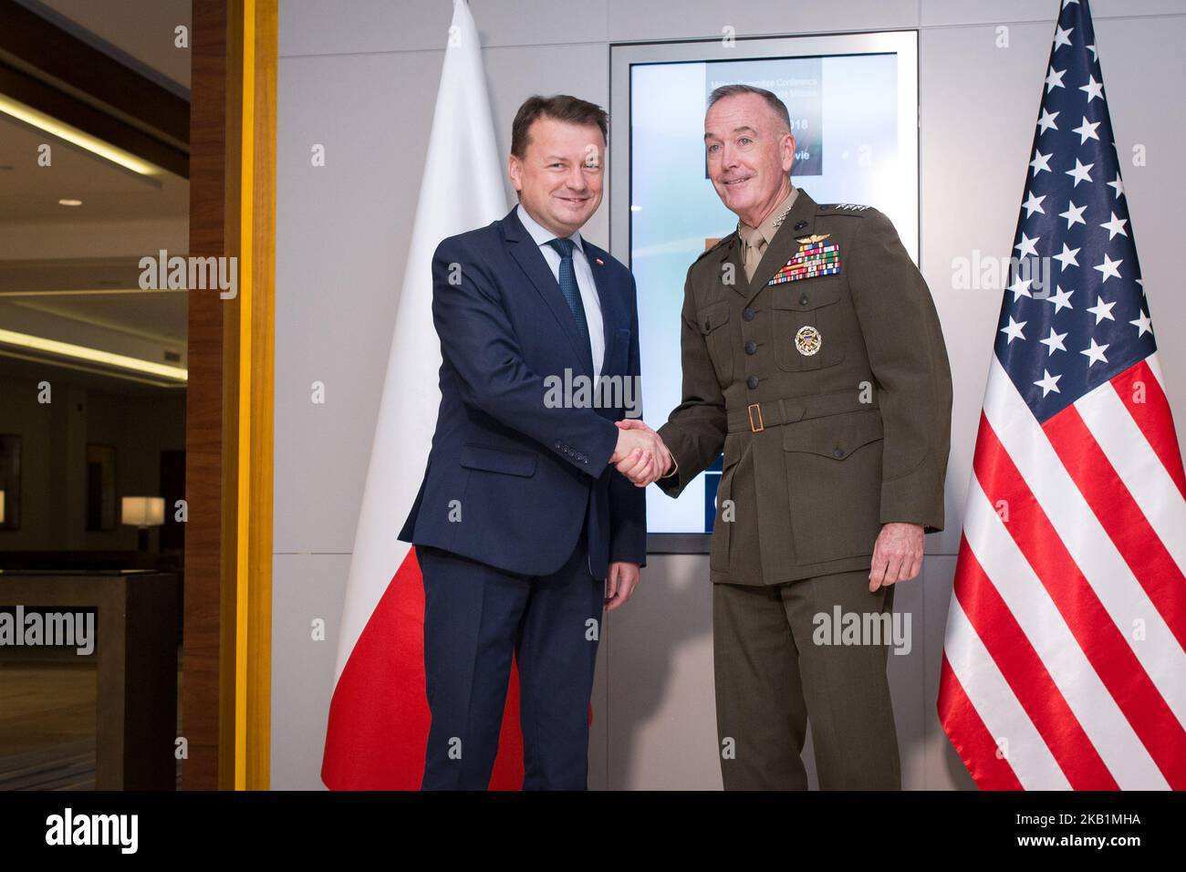 Chairman of the Joint Chiefs of Staff (highest-ranking military officer in the US Army) Joseph Dunford (R) and Poland's Defense Minister Mariusz Blaszczak (L) met during the NATO Military Committee Conference at Double Tree by Hilton hotel in Warsaw, Poland on 29 September 2018 (Photo by Mateusz Wlodarczyk/NurPhoto) Stock Photo