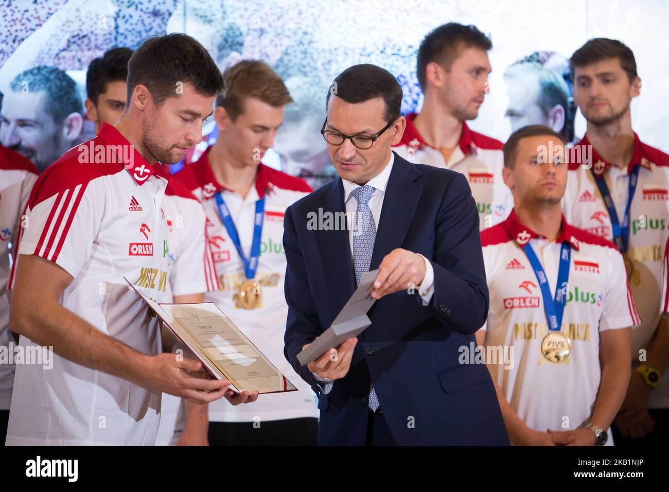 Michal Kubiak and Prime Minister of Poland Mateusz Morawiecki during the meeting with Poland men's national volleyball team at Chancellery of the Prime Minister in Warsaw, Poland on 1 October 2018. Poland won the gold medal after defeating Brazil in FIVB Volleyball Men's World Championship Final in Turin on 30 September. (Photo by Mateusz Wlodarczyk/NurPhoto) Stock Photo