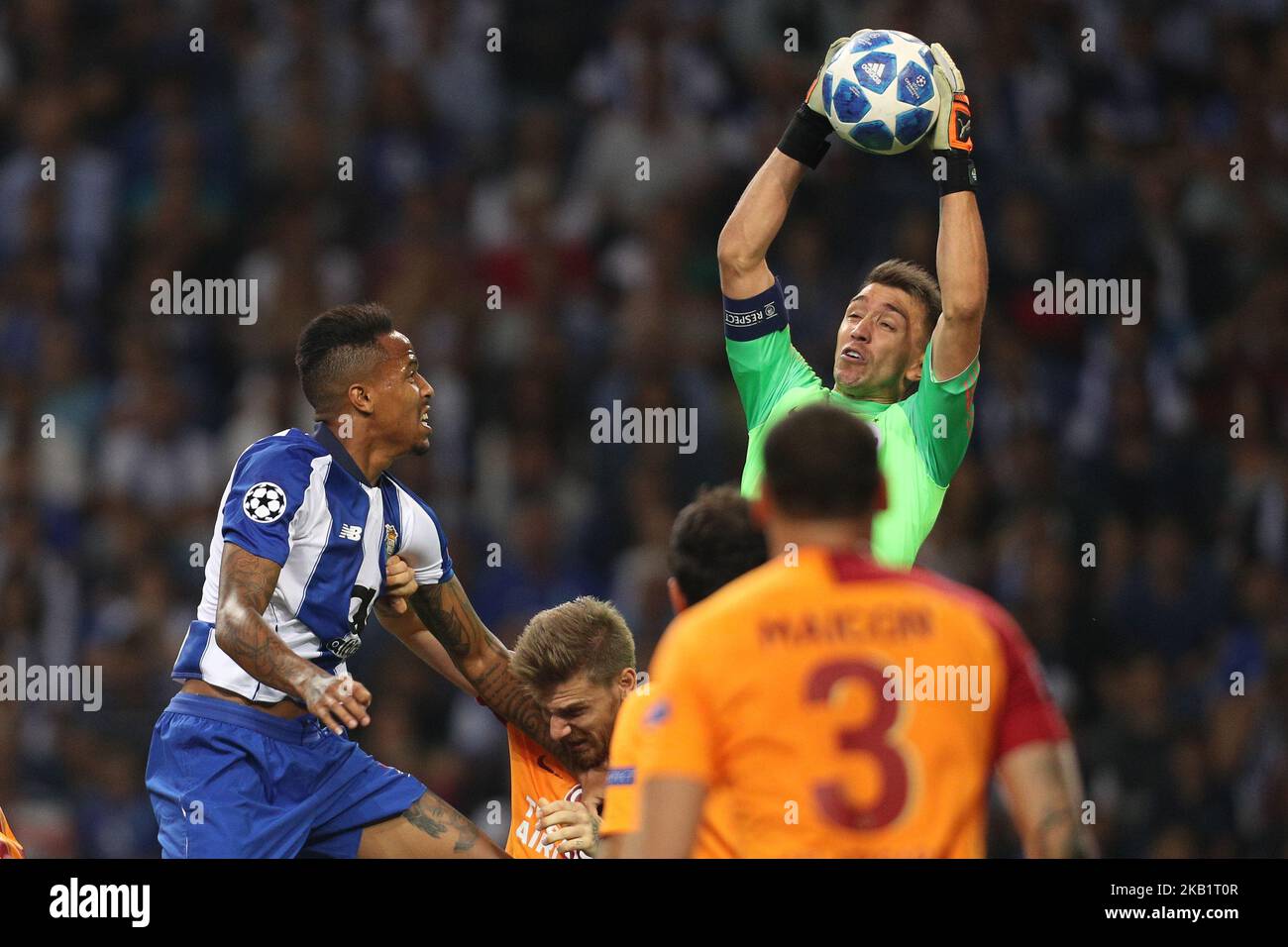 Fernando Muslera goalkeeper of Galatasaray (R) in action with Porto's Brazilian defender Eder Militao (L) during the UEFA Champions League, match between FC Porto and Galatasaray, at Dragao Stadium in Porto on October 3, 2018 in Porto, Portugal. (Photo by Paulo Oliveira / DPI / NurPhoto) Stock Photo