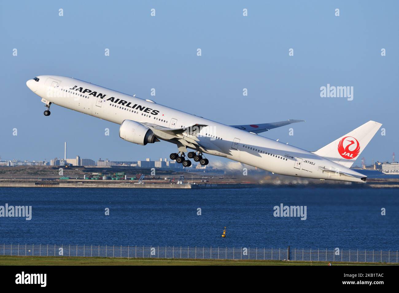 Tokyo, Japan - April 18, 2021: Japan Airlines (JAL) Boeing B777-300ER (JA740J) passenger plane take off at Tokyo International Airport. Stock Photo