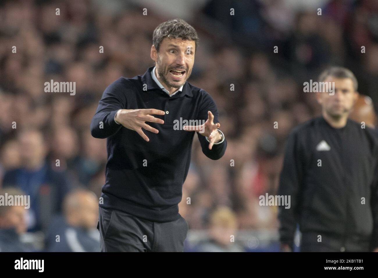 PSV Coach Mark Van Bommel reacts during the UEFA Champions League Group B match between PSV Eindhoven and FC Internazionale Milano at Philips Stadium in Eindhoven, Holland on October 3, 2018 (Photo by Andrew Surma/NurPhoto) Stock Photo