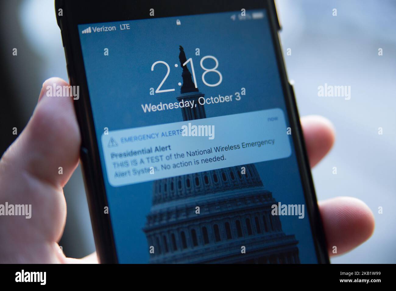 A notification is seen on a smartphone as FEMA tests the new 'Presidential Alert' functionality of the Wireless Emergency Alerts system, October 3, 2018 in Philadelphia. The new alert, which is accompanied by a loud sound and from which cellular subscribers cannot opt-out, is designed to be used by the President to communicate to the public during a national emergency. (Photo by Michael Candelori/NurPhoto) Stock Photo