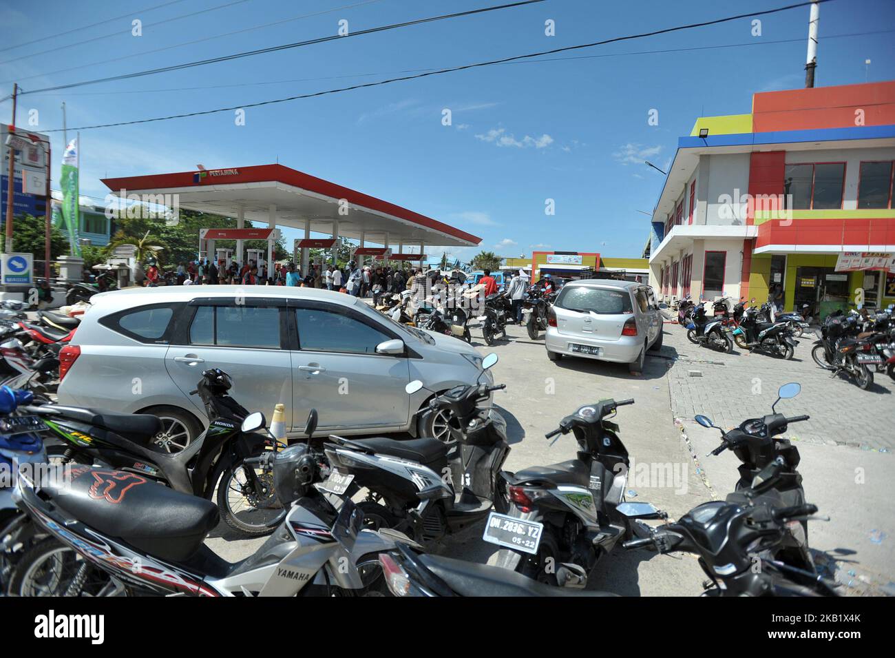 Thousands of people queue with jerry cans at one of the Public Fuel Filling Stations (SPBU) in