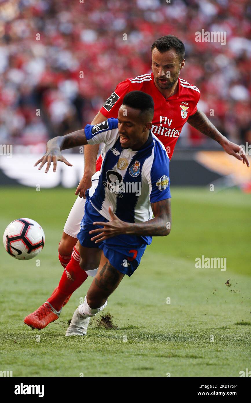 Haris Seferovic of Benfica (R) vies for the ball with Eder Militao of Porto during the Portuguese League football match between SL Benfica and FC Porto at Luz Stadium in Lisbon, Portugal on October 7, 2018. (Photo by Carlos Palma/NurPhoto) Stock Photo