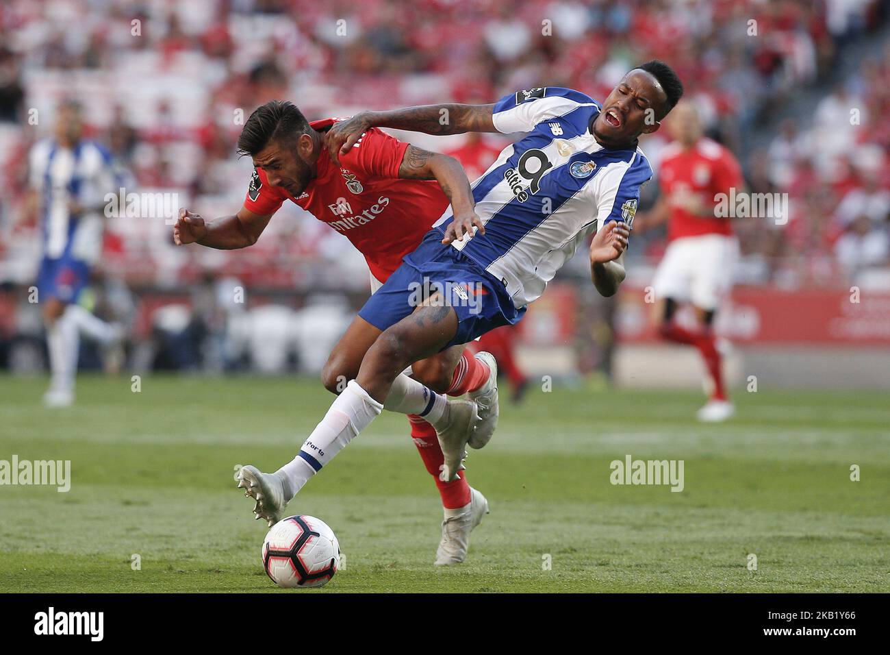 Eduardo Salvio of Benfica (L) vies for the ball with Eder Militao of Porto (R) during the Portuguese League football match between SL Benfica and FC Porto at Luz Stadium in Lisbon, Portugal on October 7, 2018. (Photo by Carlos Palma/NurPhoto) Stock Photo