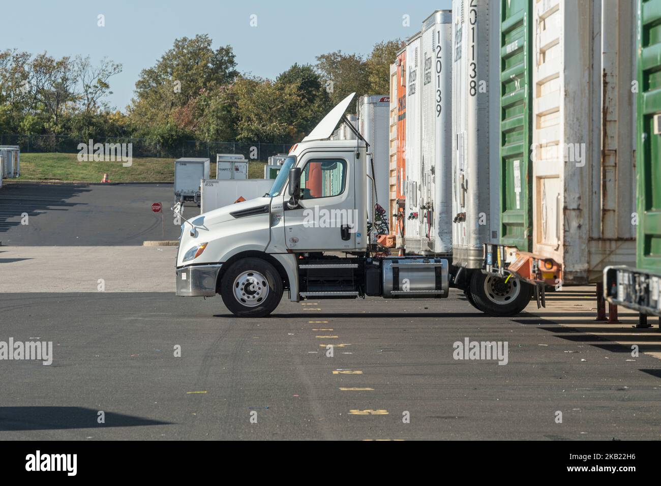 Row of many trucking trailers Stock Photo