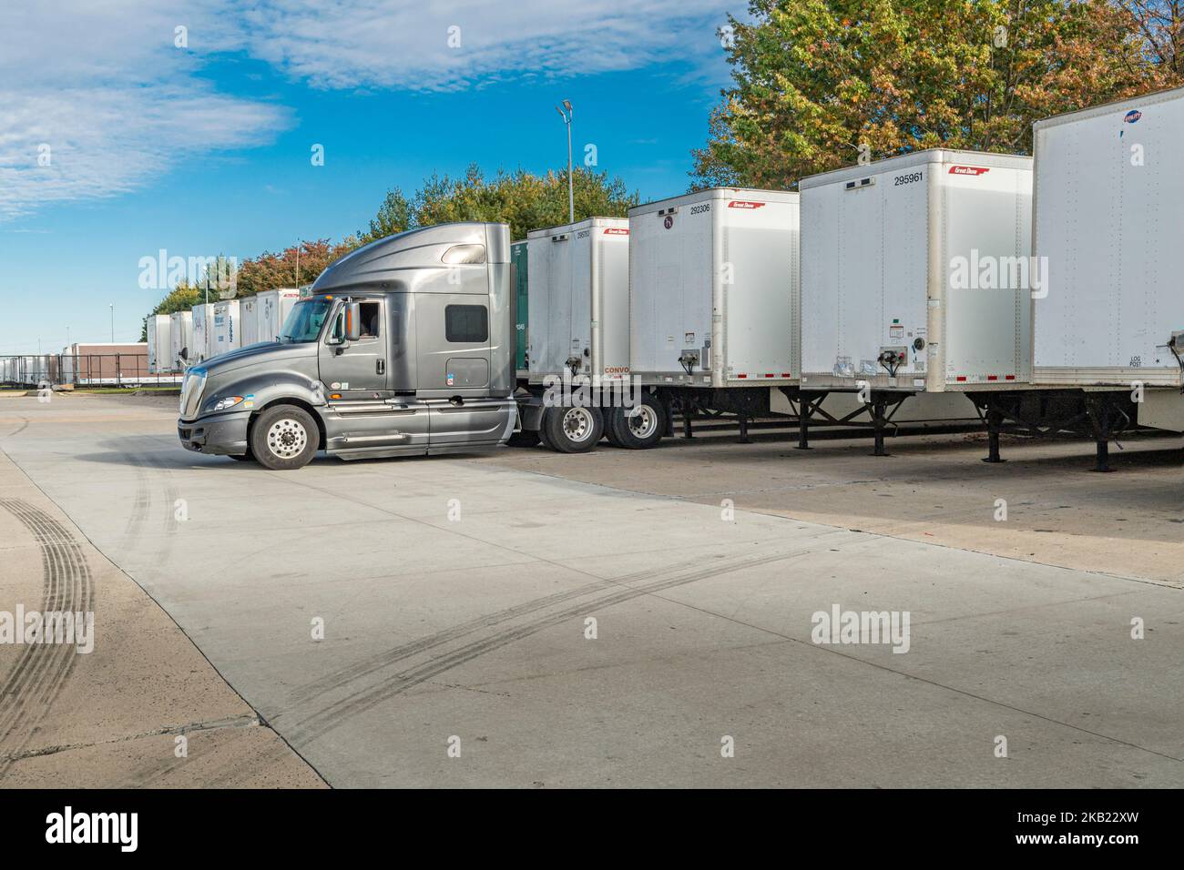 Row of many trucking trailers Stock Photo