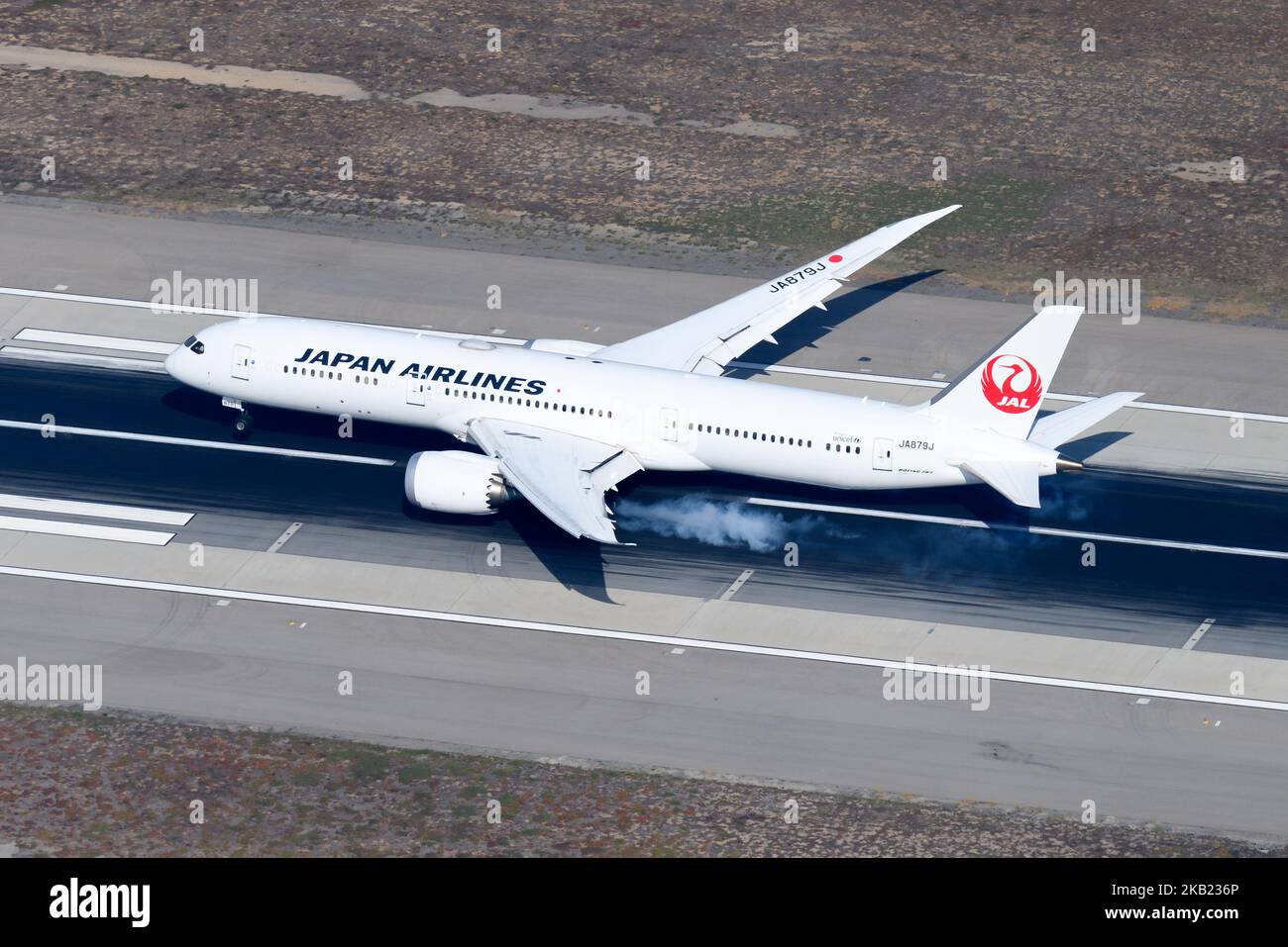 Japan Airlines Boeing 787-9 Dreamliner airplane landing at airport runway. Aircraft B787 of JAL Airlines. Plane JA879J. Stock Photo