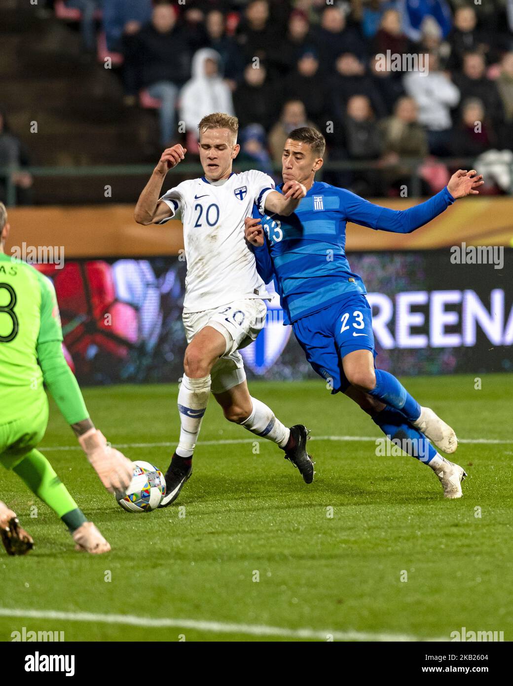 KÅstas Tsimikas (#23) of Greece and Jasse Tuominen of Finland vie for the ball during the UEFA Nations League group stage football match Finland v Grece in Tampere, Finland on October 15, 2018. (Photo by Antti Yrjonen/NurPhoto) Stock Photo