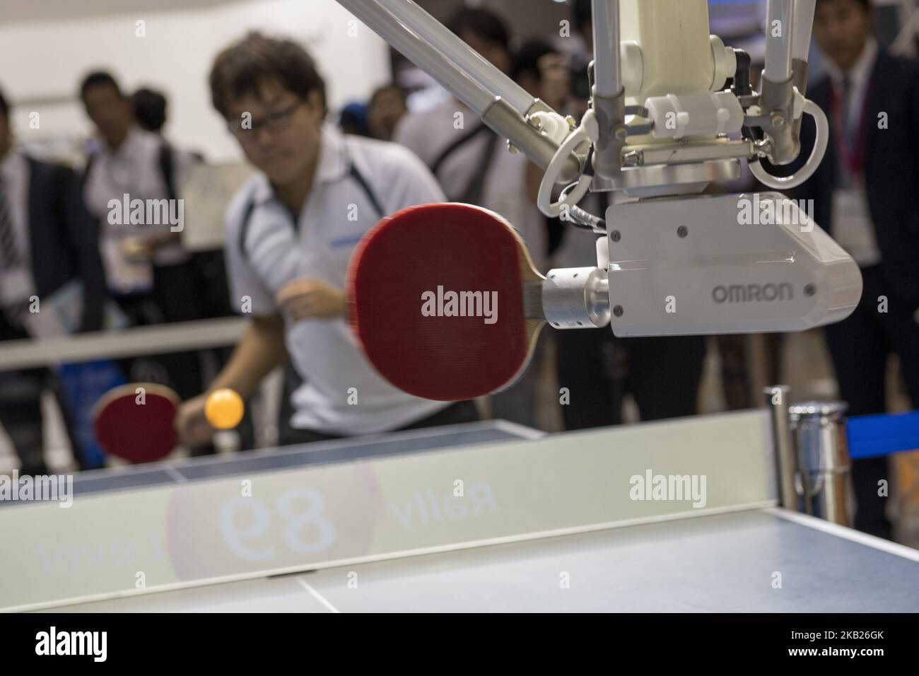 A robot playing against a real player at the Omron Stand during the Japan Robot Week 2018 in Tokyo on October 17, 2018.. Omron is introducing new developments in the Field of artificial intelligence. (Photo by Alessandro Di Ciommo/NurPhoto) Stock Photo