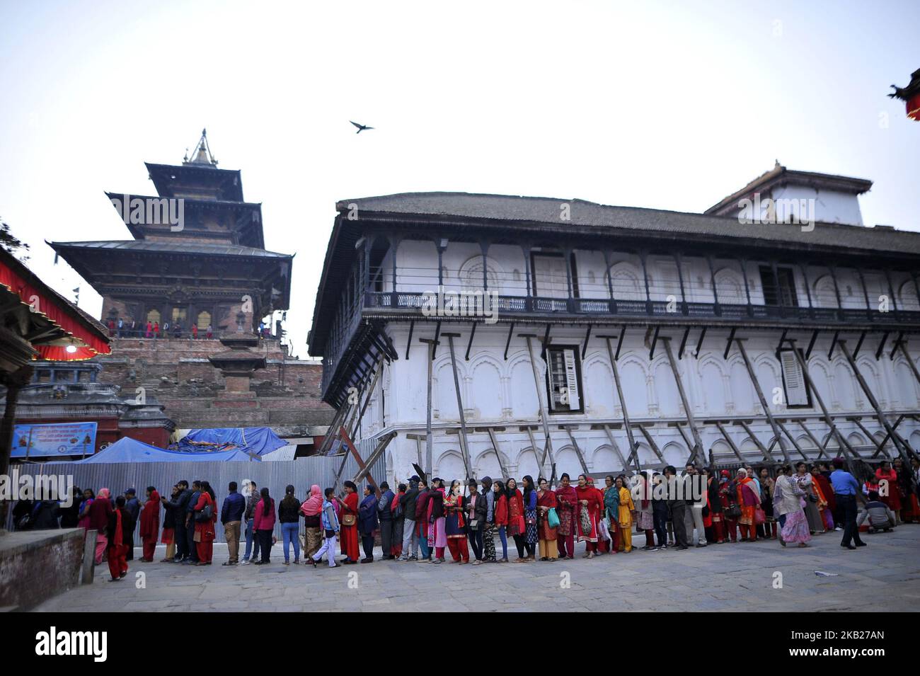 Nepalese devotees lining around the premises of Taleju Temple to pay