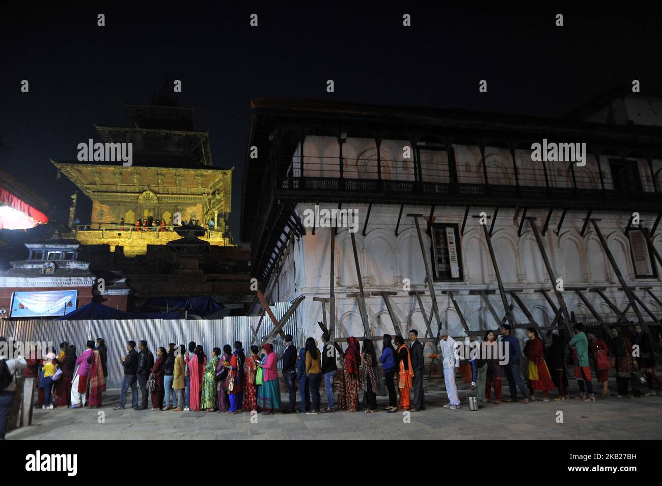 Nepalese devotees lining around the premises of Taleju Temple to pay
