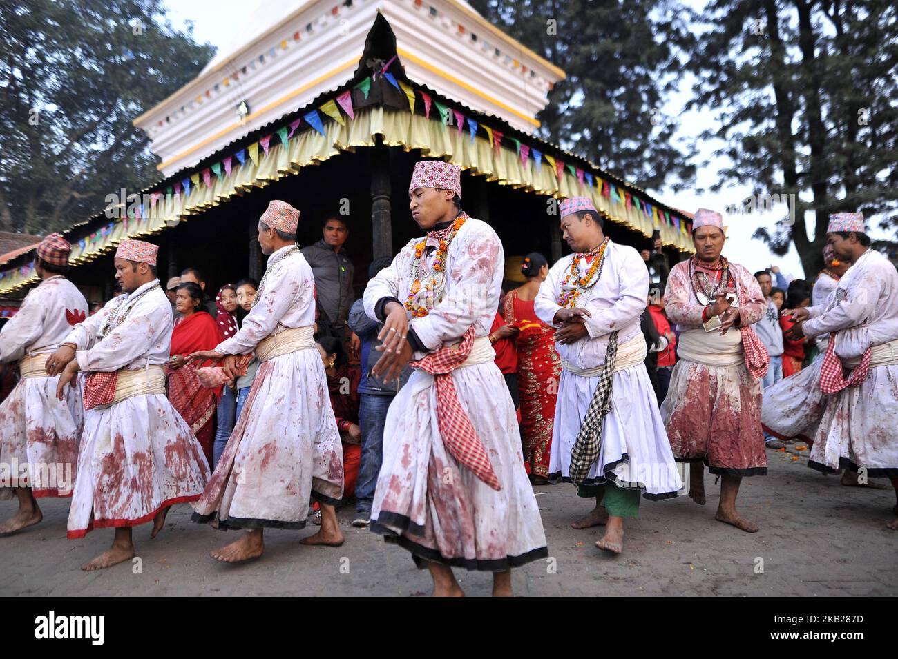 Nepalese Hindu priests perform a ritual dance during the tenth day of