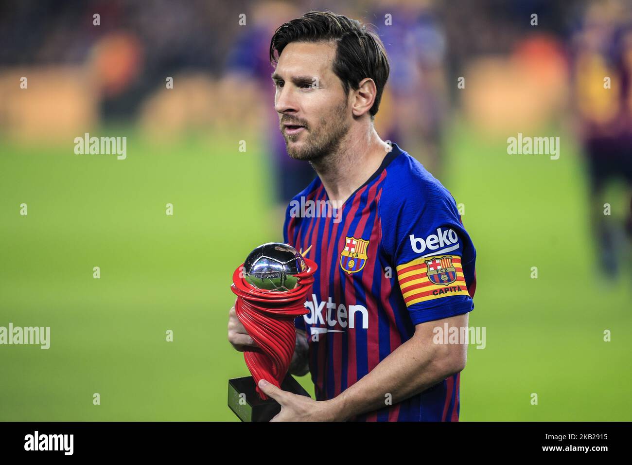Leo Messi of FC Barcelona with the trophy of La Liga player of the