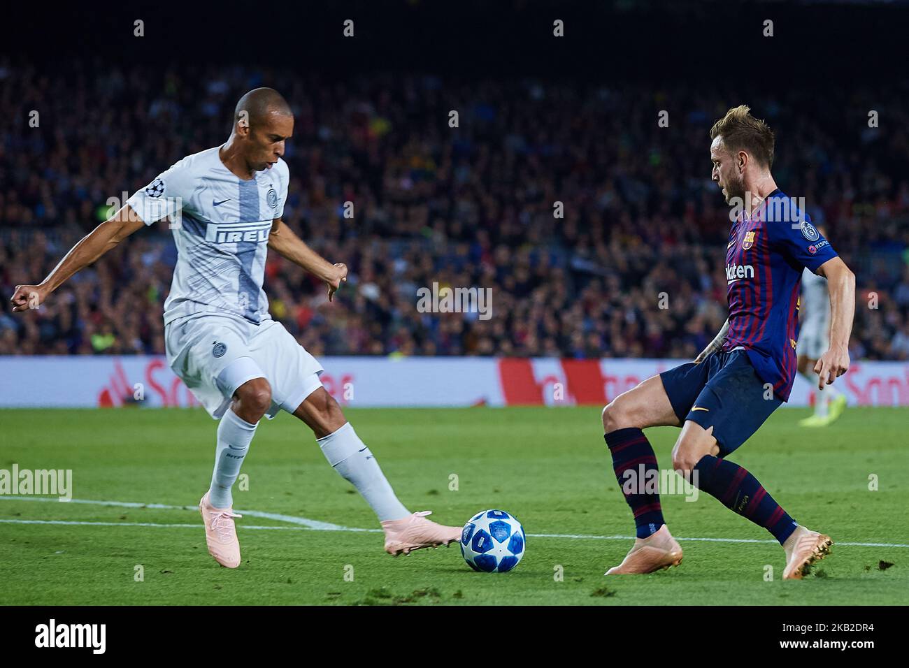 Joao Miranda of FC Internazionale (L) and Ivan Rakitic of FC Barcelona (R) competes for the ball during the UEFA Champions League group B match between FC Barcelona and FC Internazionale at Camp Nou on October 24, 2018 in Barcelona, Spain (Photo by Sergio Lopez/NurPhoto) Stock Photo