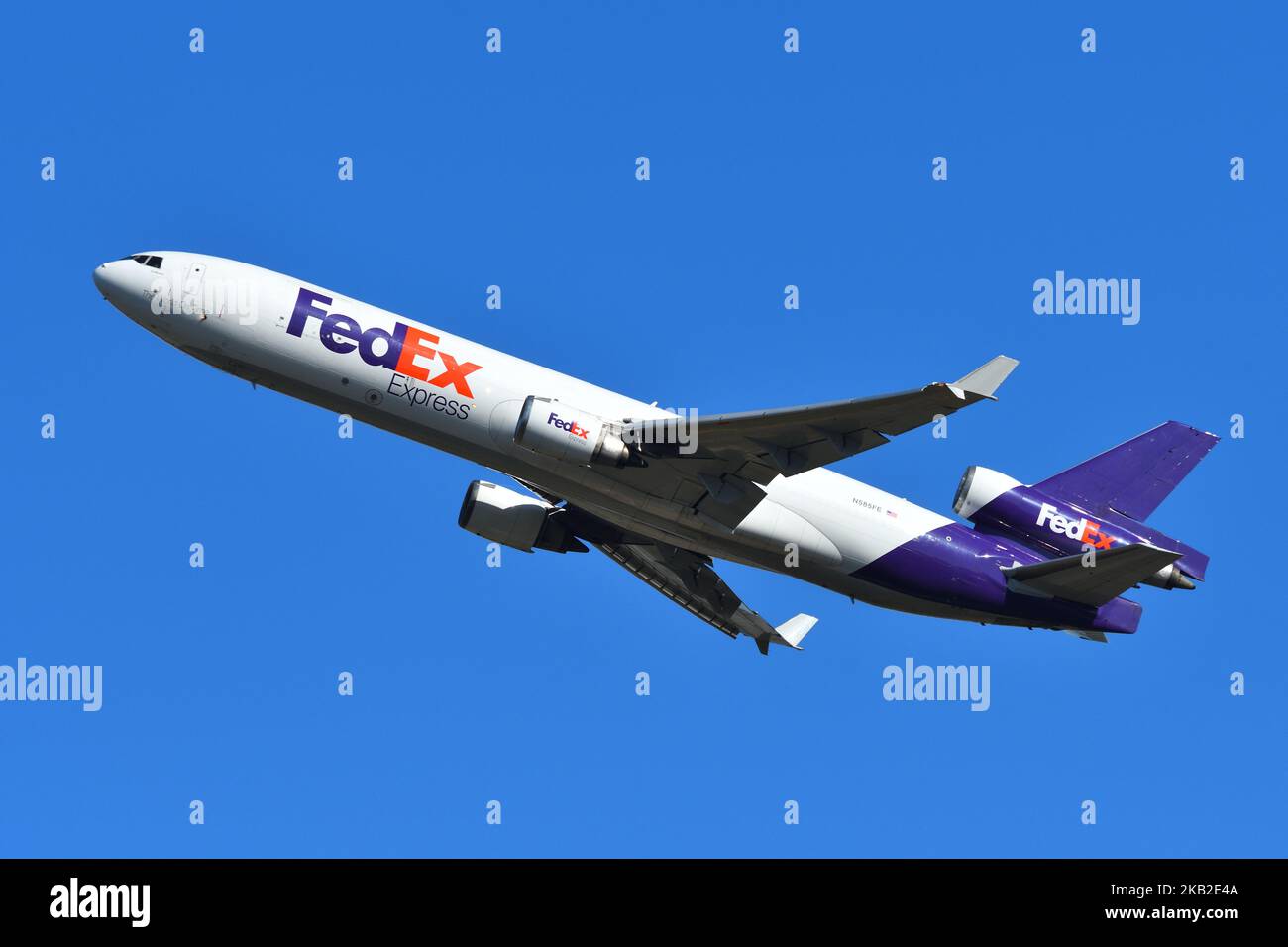 Chiba prefecture, Japan - October 29, 2021: FedEx McDonnell Douglas MD-11F (N585FE) freighter take off at Narita International Airport. Stock Photo