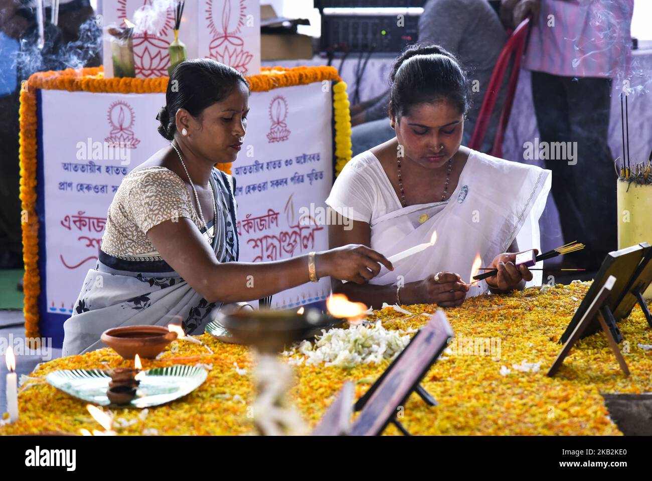 Family members pay tribute to the victims of October 30, 2008, serial bomb blasts on its 10th anniversary at the place of blast in Ganeshguri of Guwahati, Assam, India on Tuesday, October 30, 2018. The 2008 Assam bombings occurred on 30 October 2008. The blasts ripped apart Guwahati, Barpeta Road, Bongaigaon and Kokrajhar. The explosions in Guwahati ripped through Pan Bazar, Fancy Bazar and Ganeshguri, which were crowded with shoppers and office goers. In Guwahati, 41 people were killed; in Kokrajhar, 21; and in Barpeta Road, 15. (Photo by David Talukdar/NurPhoto) Stock Photo
