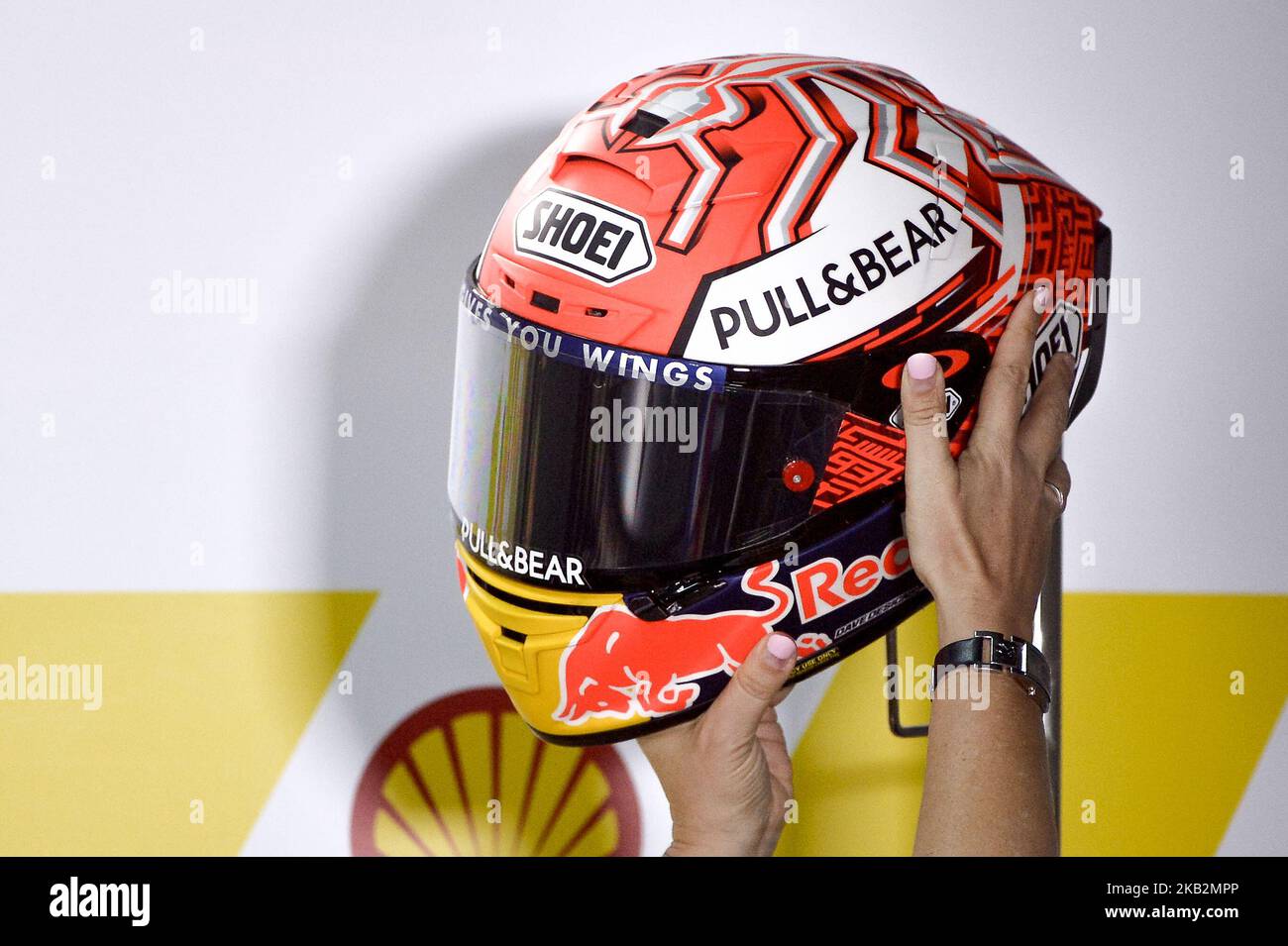 The helmet of Spanish rider Marc Marquez and Honda Repsol Team being  prepared during a press conference ahead of the Malaysian MotoGP at the  Sepang International circuit in Sepang on November 1,