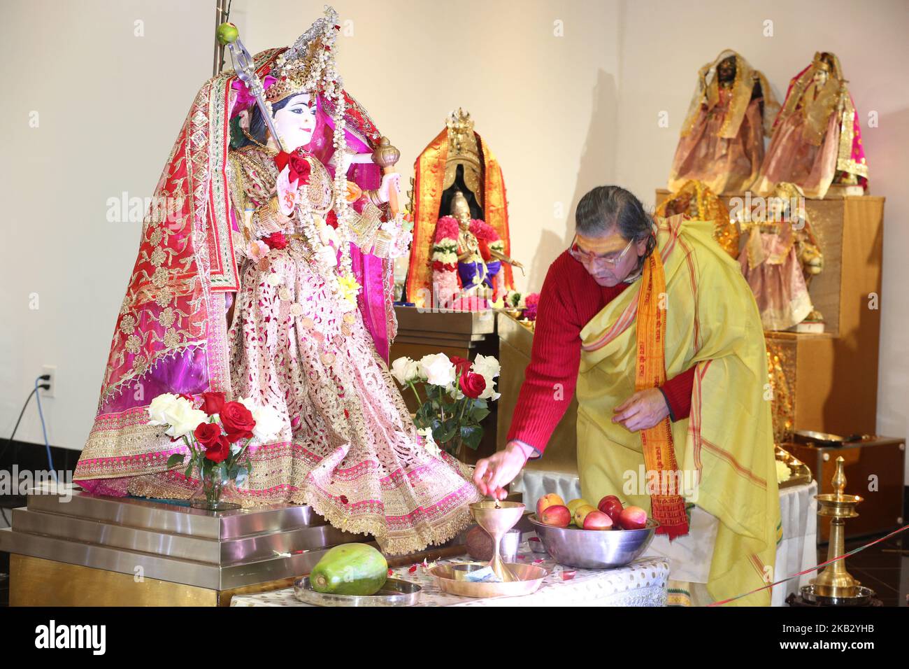 Hindu priest performs prayers during the festival of Diwali (Deepawali) at a Hindu temple in Toronto, Ontario, Canada on November 7, 2018. Lakshmi (Laxmi) is the Hindu Goddess of wealth and prosperity. (Photo by Creative Touch Imaging Ltd./NurPhoto) Stock Photo