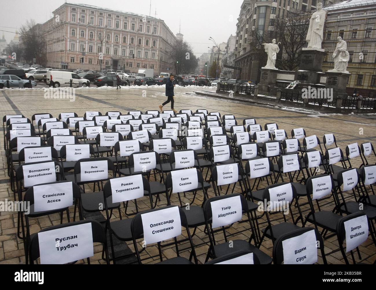 The sheets with names of Ukrainian political prisoners, whose arrests in Russia and Crimea were politically-motivated according to organizers, is seen during a performance 'Free Chairs' to support of arrested Ukrainian political prisoners, in Kiev, Ukraine, 15 November, 2018. (Photo by STR/NurPhoto) Stock Photo