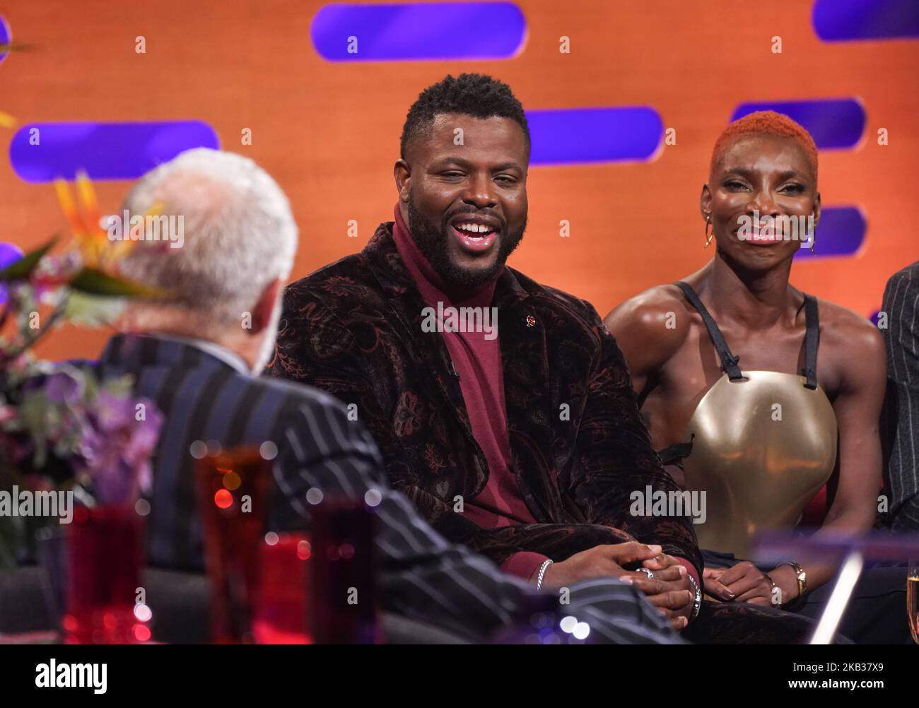 EDITORIAL USE ONLY Graham Norton, Winston Duke and Michaela Coel during the filming for the Graham Norton Show at BBC Studioworks 6 Television Centre, Wood Lane, London, to be aired on BBC One on Friday evening. Picture date: Thursday November 3, 2022. Stock Photo