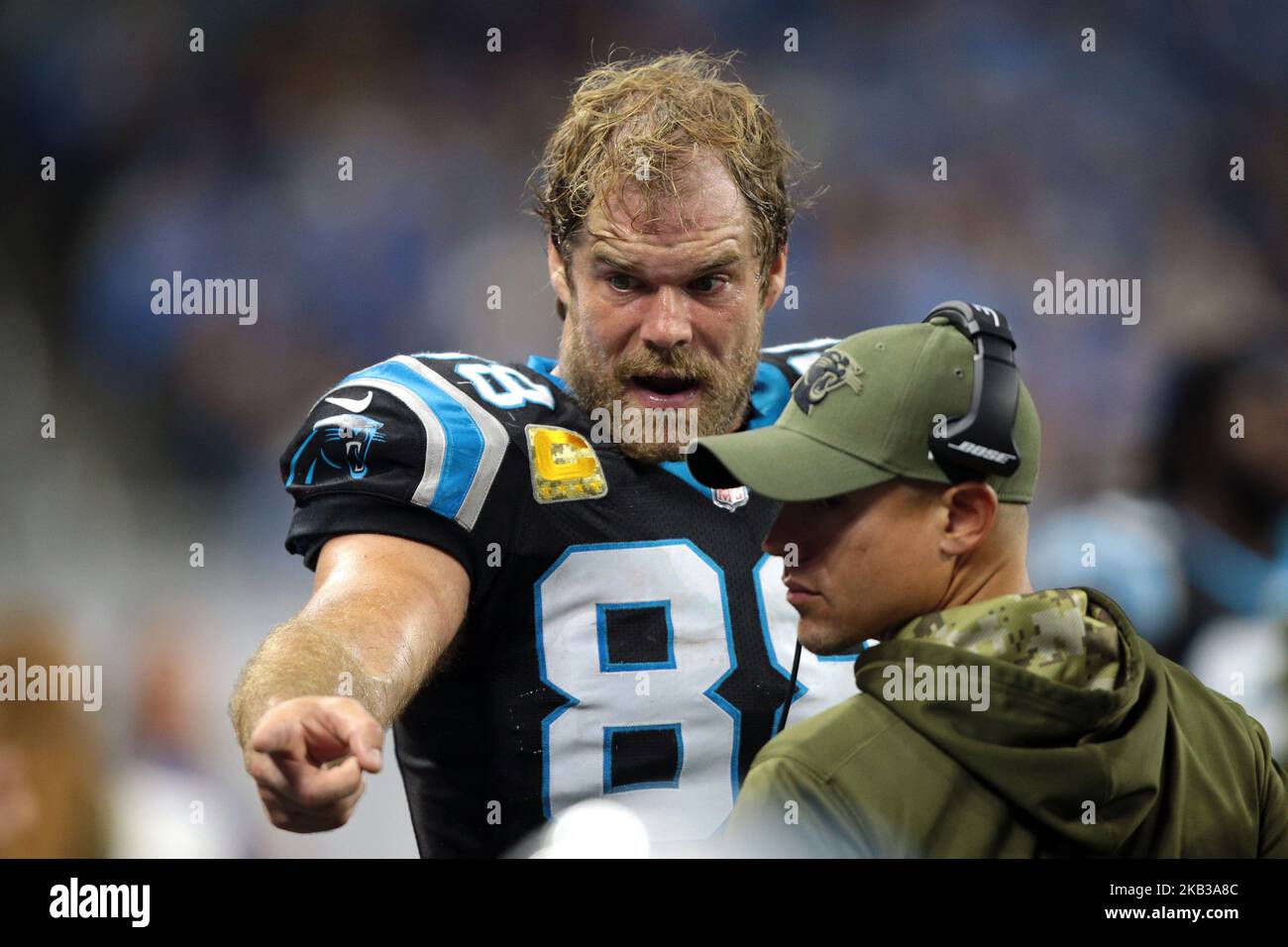 Carolina Panthers tight end Greg Olsen (88) stands on the sideline as the Panthers  play the Los Angeles Rams in the second half of an NFL football game in  Charlotte, North Carolina