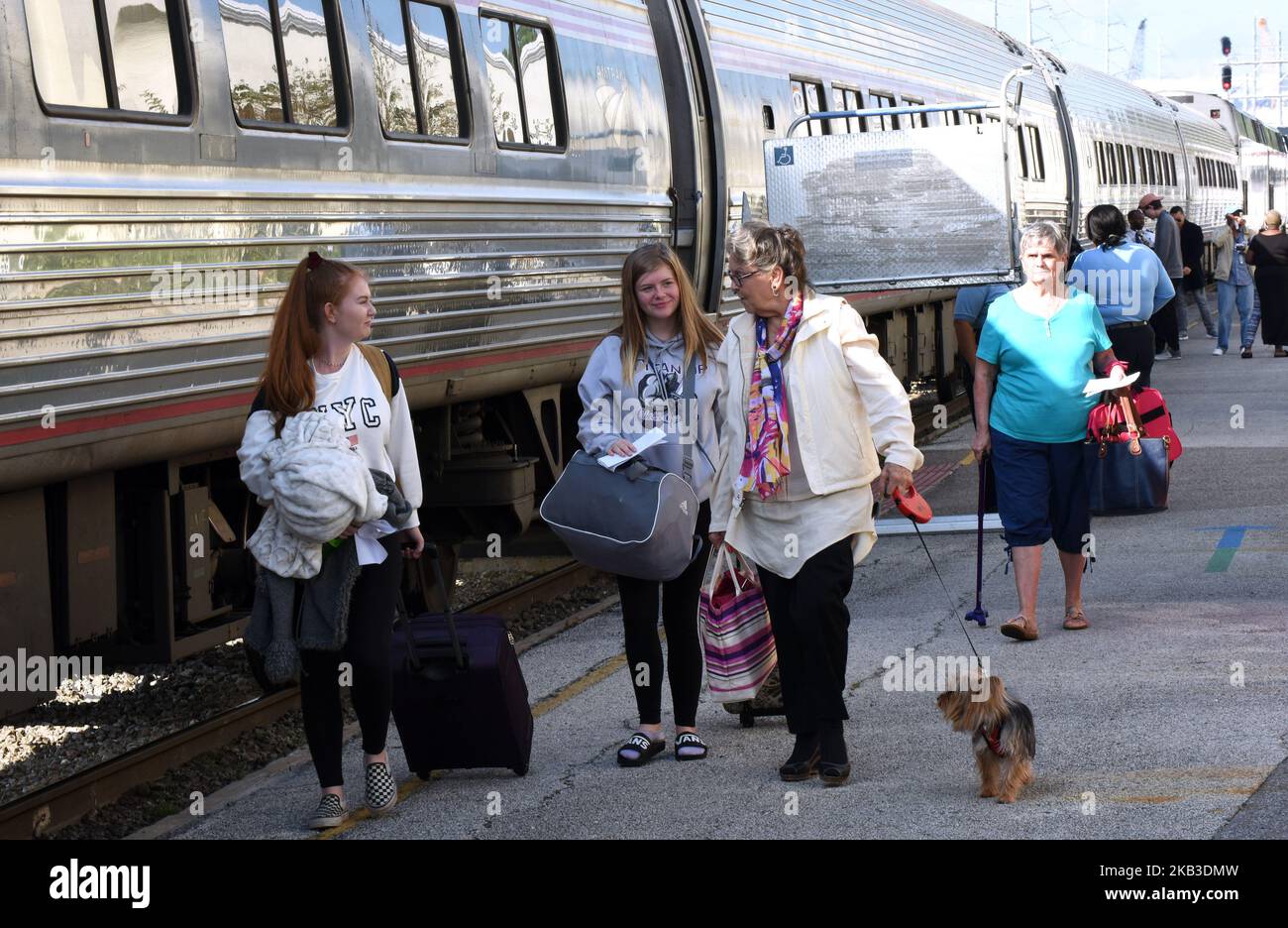 Passengers prepare to board a northbound Amtrak train on Thanksgiving eve at the Amtrak station