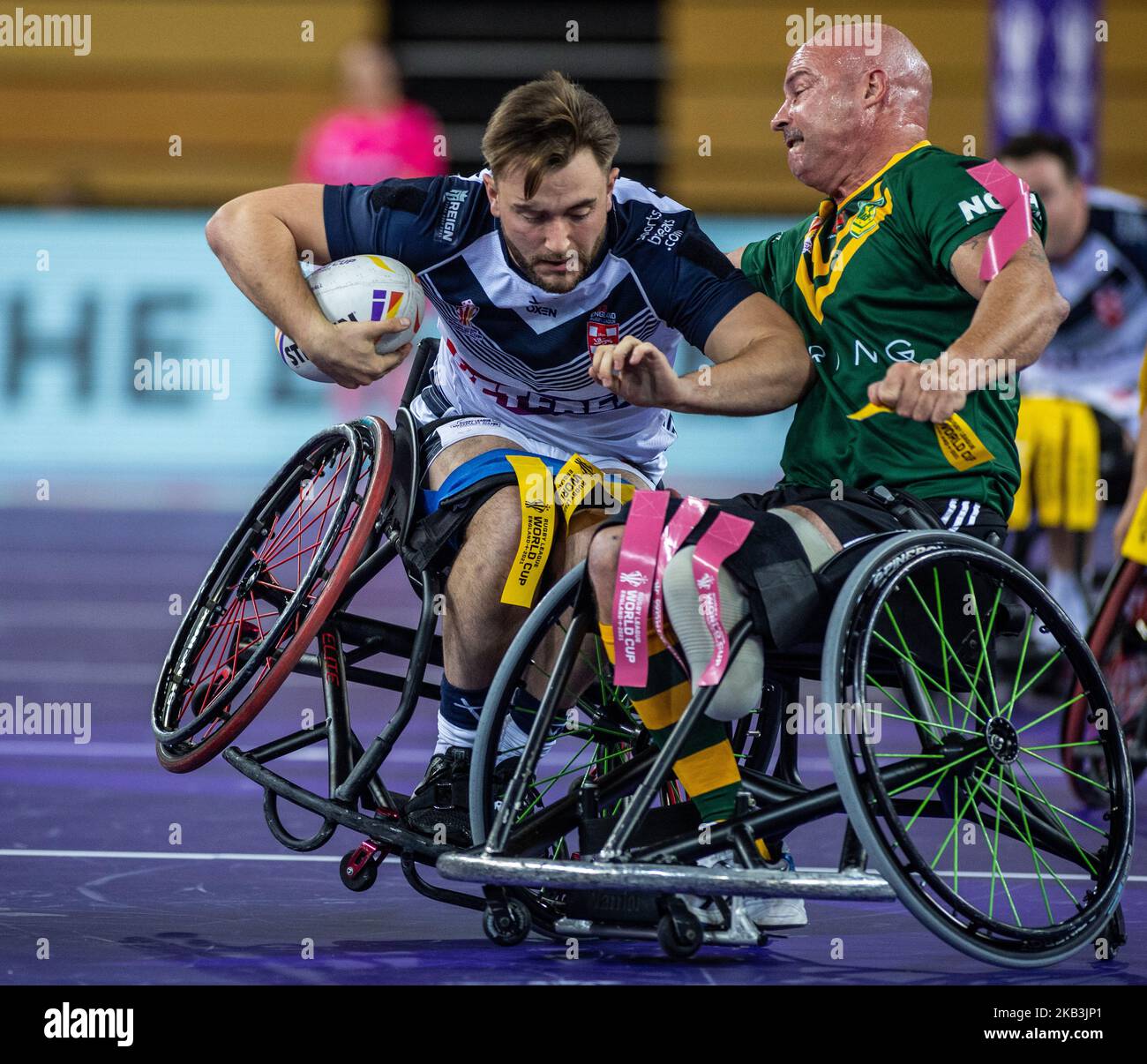 England's Sebastien Bechara is tackled by Australia's Peter Arbuckle during the Wheelchair Rugby League World Cup group A match at the Copper Box Arena, London. Picture date: Thursday November 3, 2022. Stock Photo