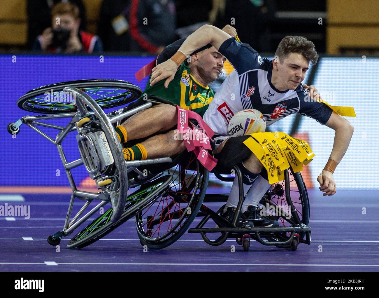 England's Robert Hawkins is tackled by Australia's Bayley McKenna