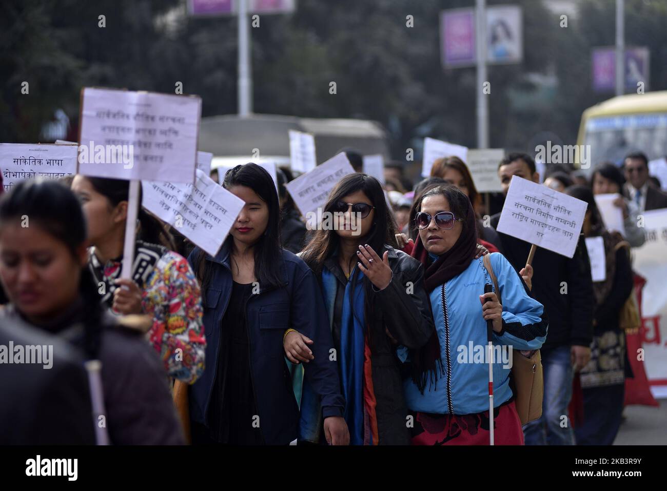 Visually impaired Nepalese people take part in a rally during 27th International Day of Persons with Disabilities in Kathmandu, Nepal on Monday, December 03, 2018. The 27th World Disability Day focuses on 'Empowering persons with disabilities and ensuring inclusiveness and equality'. (Photo by Narayan Maharjan/NurPhoto) Stock Photo