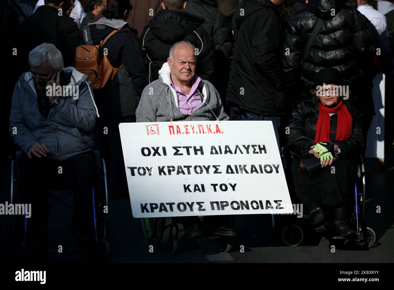 People protest for disabled rights on the occasion of the International Day for Persons with Disabilities in Athens, Greece on December 3, 2018. Protesters demand wage and social welfare since they have been eliminated by years of austerity measures. (Photo by Giorgos Georgiou/NurPhoto) Stock Photo