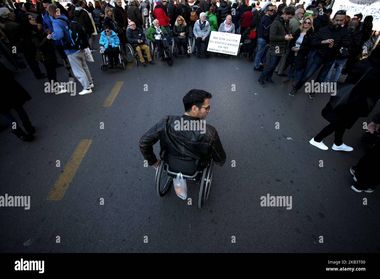 People protest for disabled rights on the occasion of the International Day for Persons with Disabilities in Athens, Greece on December 3, 2018. Protesters demand wage and social welfare since they have been eliminated by years of austerity measures. (Photo by Giorgos Georgiou/NurPhoto) Stock Photo